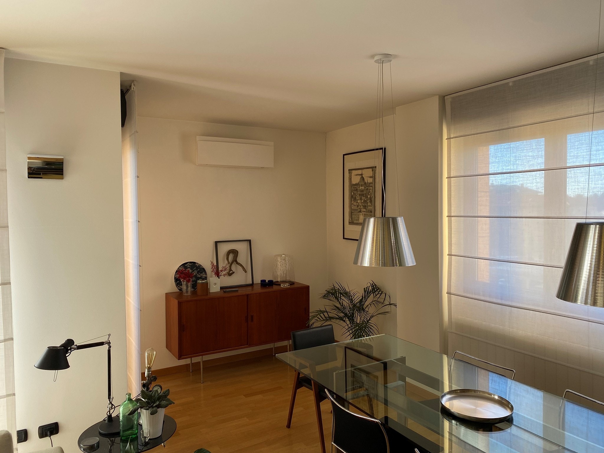 A living room with a mounted Daikin installation